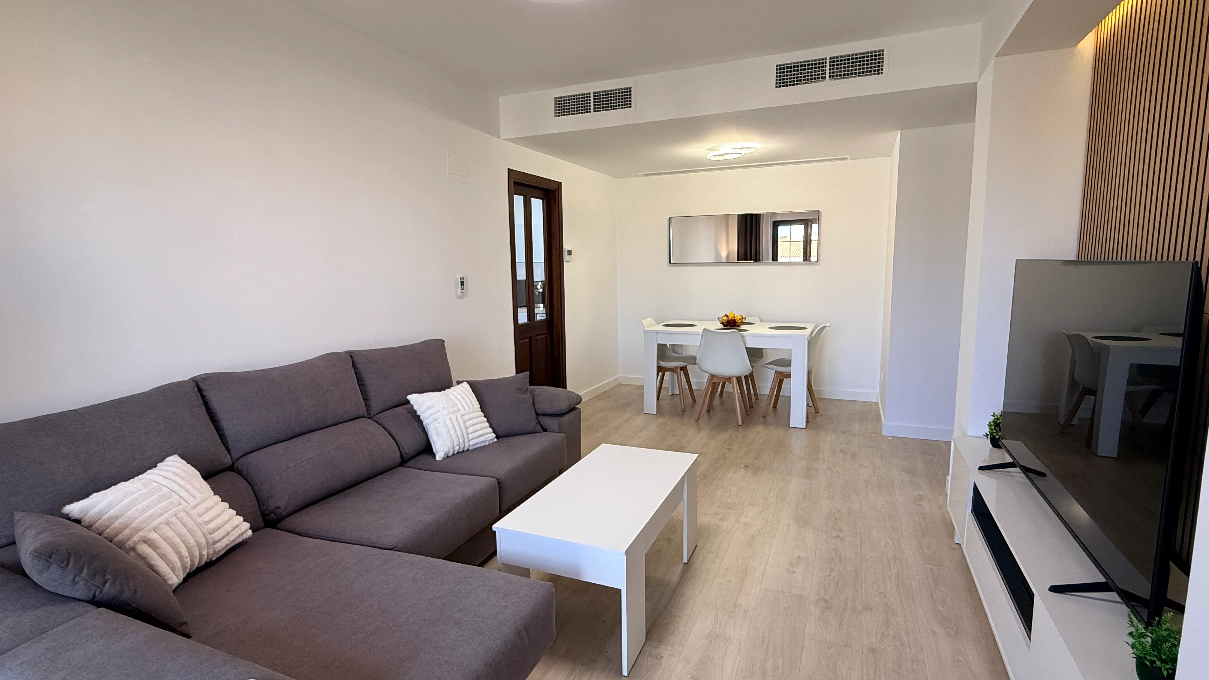 Hacienda del Álamo apartment living room view 2